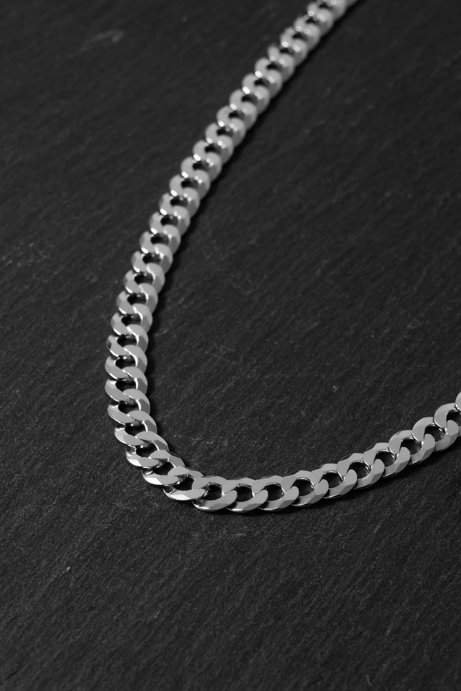 Why men who wear a silver tank chain are rarely wrong